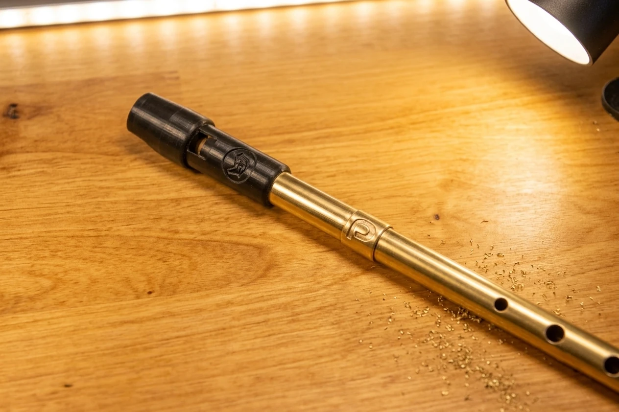 Tin whistle on a workbench